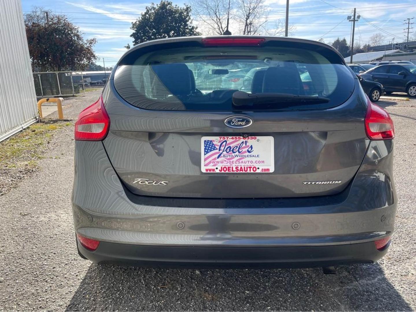 2015 Grey /Black Ford Focus Titanium (1FADP3N26FL) with an 2.0 4 CYL engine, Auto transmission, located at 5700 Curlew Drive, Norfolk, VA, 23502, (757) 455-6330, 36.841885, -76.209412 - Photo#6